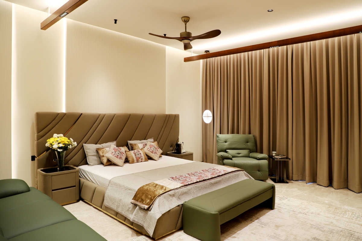 Warm modern bedroom with layered bedding